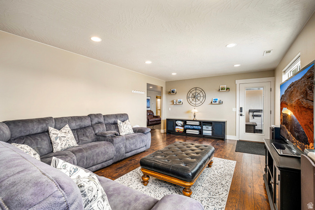 2311 South 1340 West St. George, UT 84770 - Photo 37 of 56 Living area featuring dark wood finished floors and recessed lighting