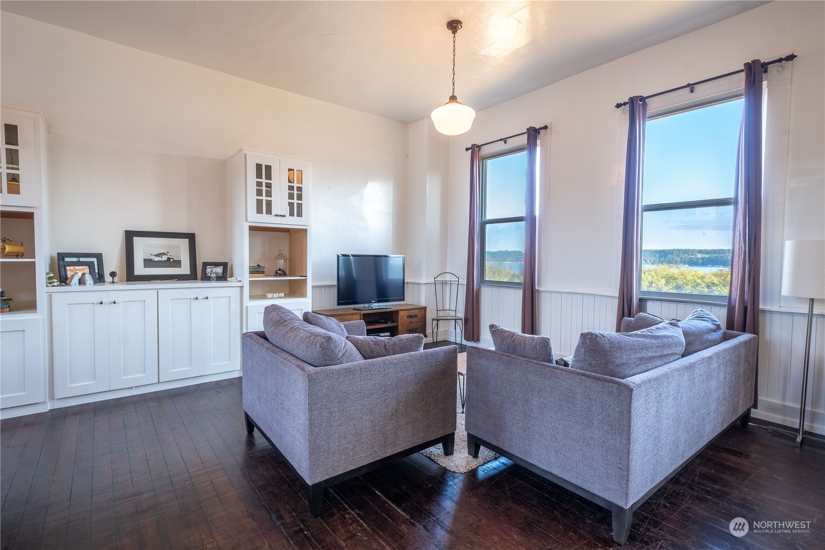 650 Zylstra Road Coupeville, WA 98239 - Photo 11 of 26 a living room with furniture and a flat screen tv