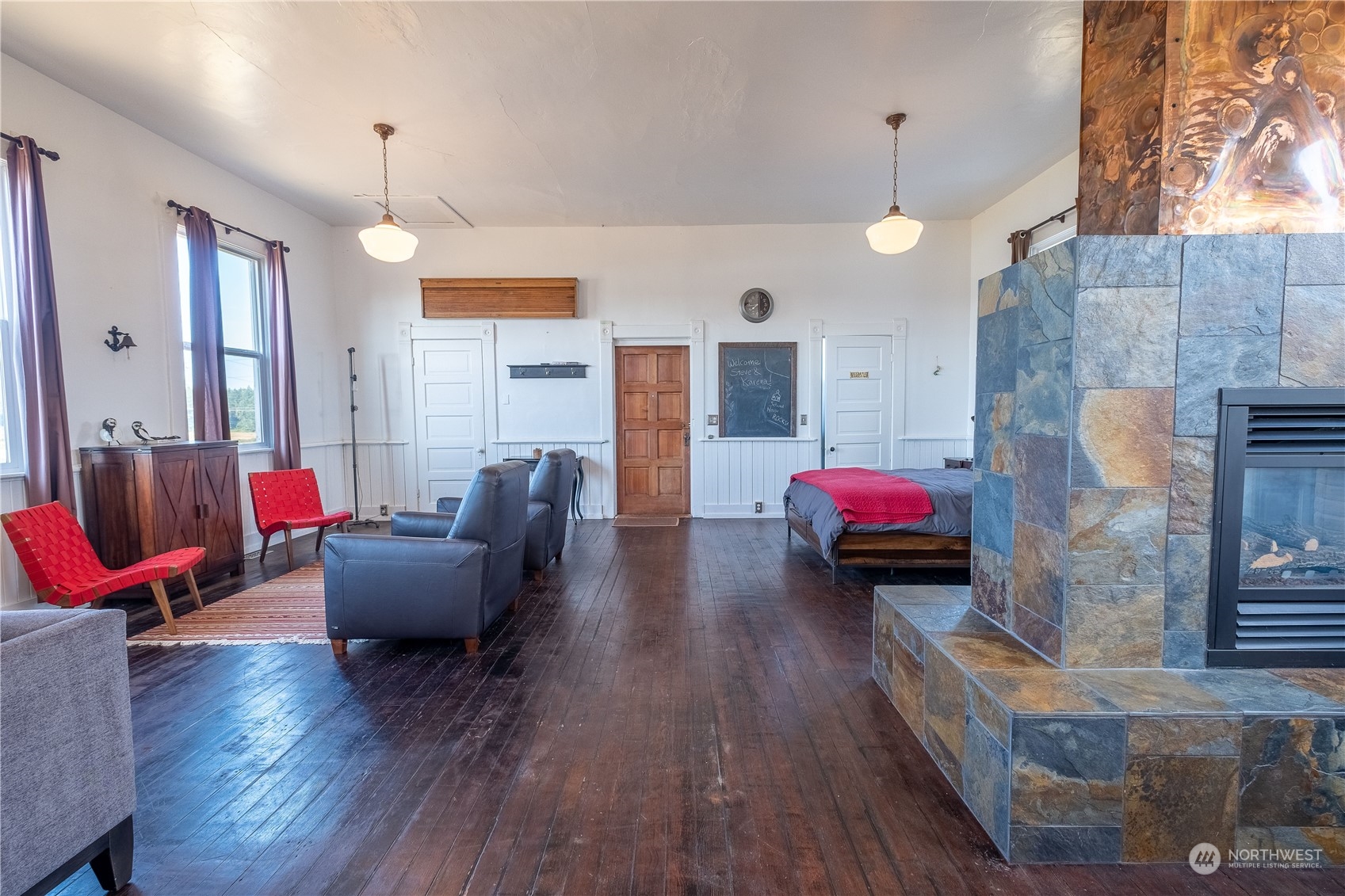 650 Zylstra Road Coupeville, WA 98239 - Photo 20 of 26 a living room with furniture and wooden floor