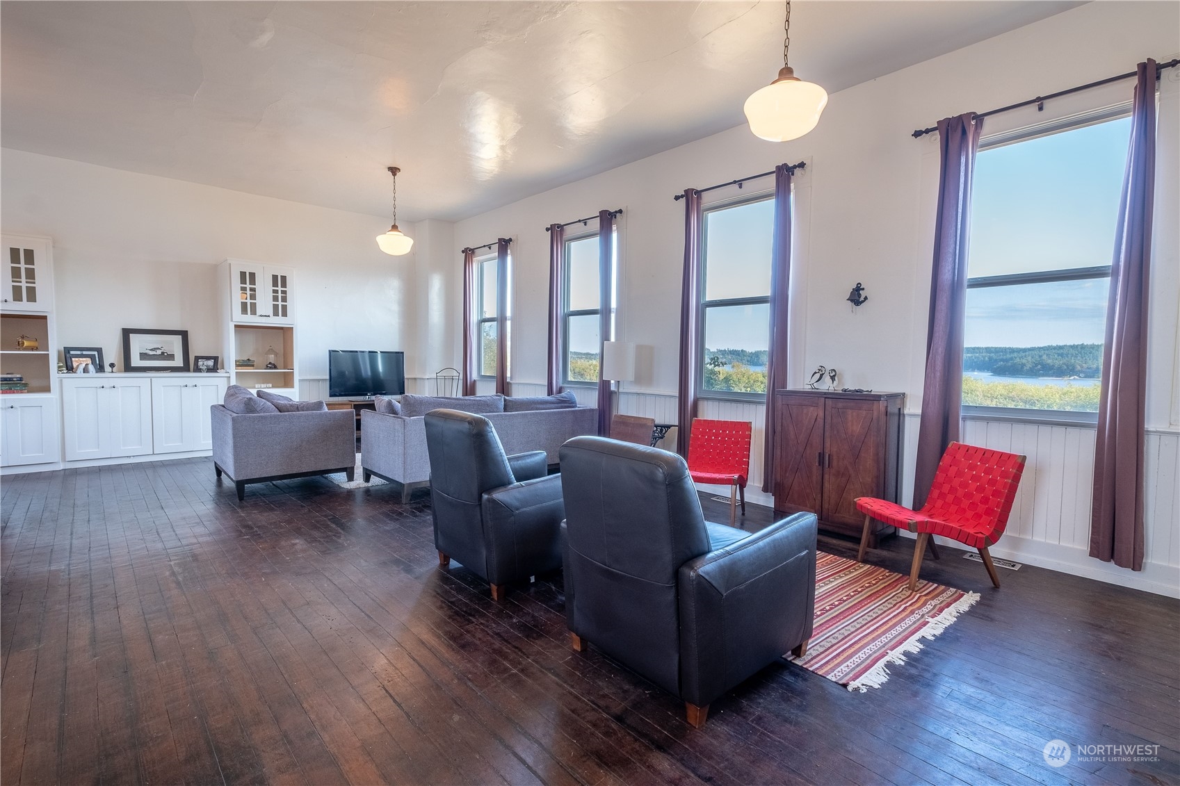 650 Zylstra Road Coupeville, WA 98239 - Photo 21 of 26 a living room with furniture and wooden floor