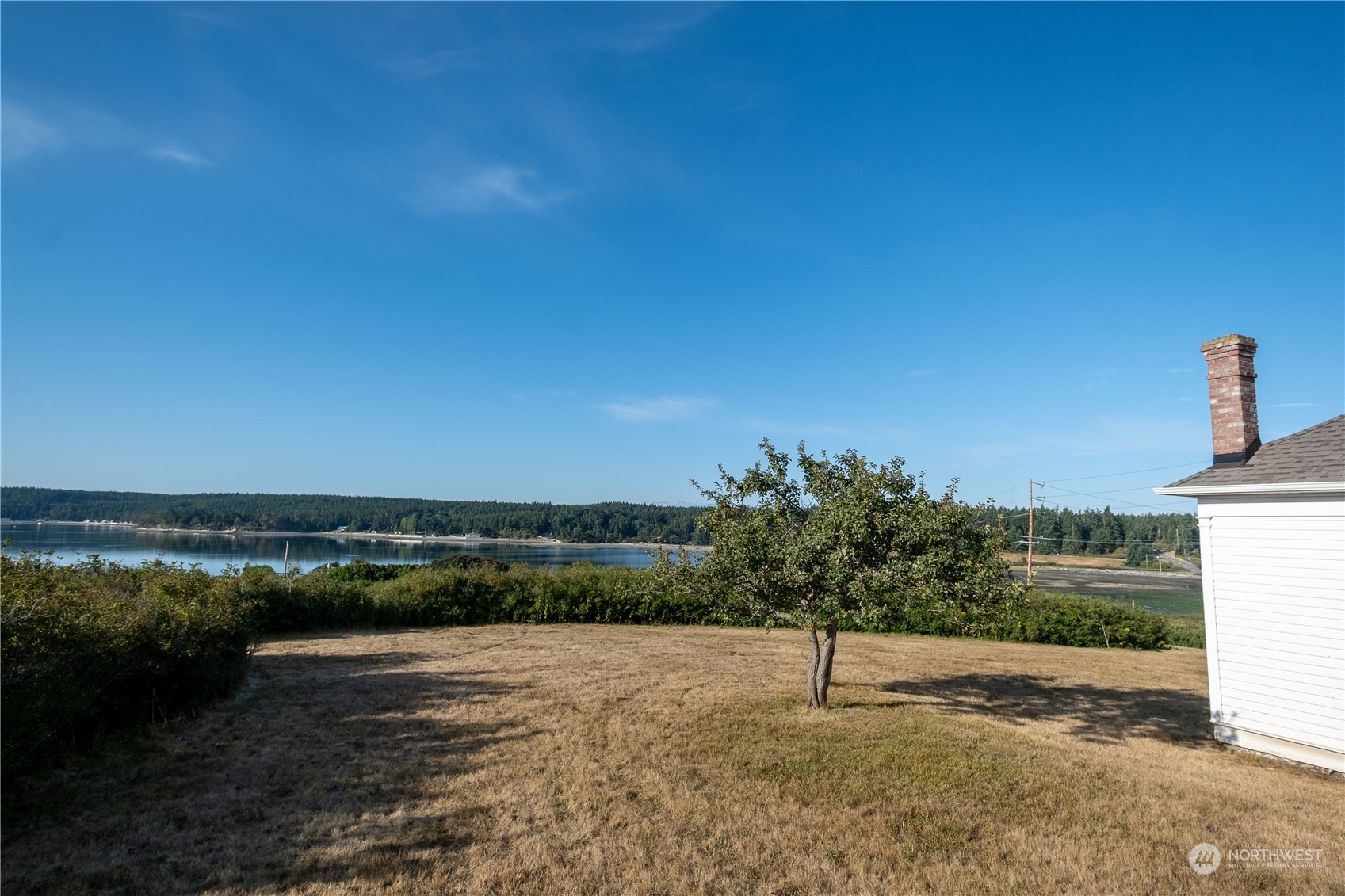 650 Zylstra Road Coupeville, WA 98239 - Photo 26 of 26 a view of a lake with beach