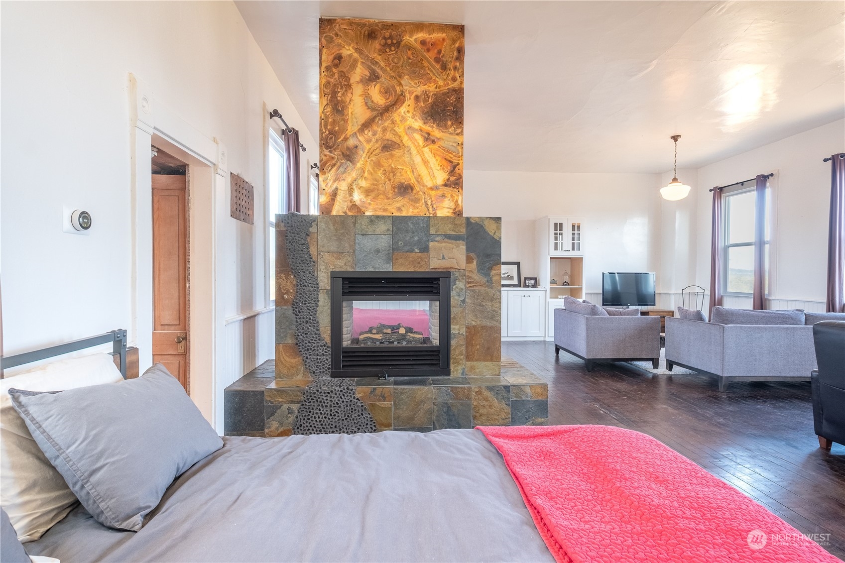650 Zylstra Road Coupeville, WA 98239 - Photo 6 of 26 a living room with furniture and a fireplace