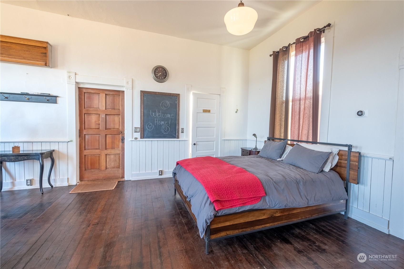 650 Zylstra Road Coupeville, WA 98239 - Photo 7 of 26 a bedroom with a bed and a table