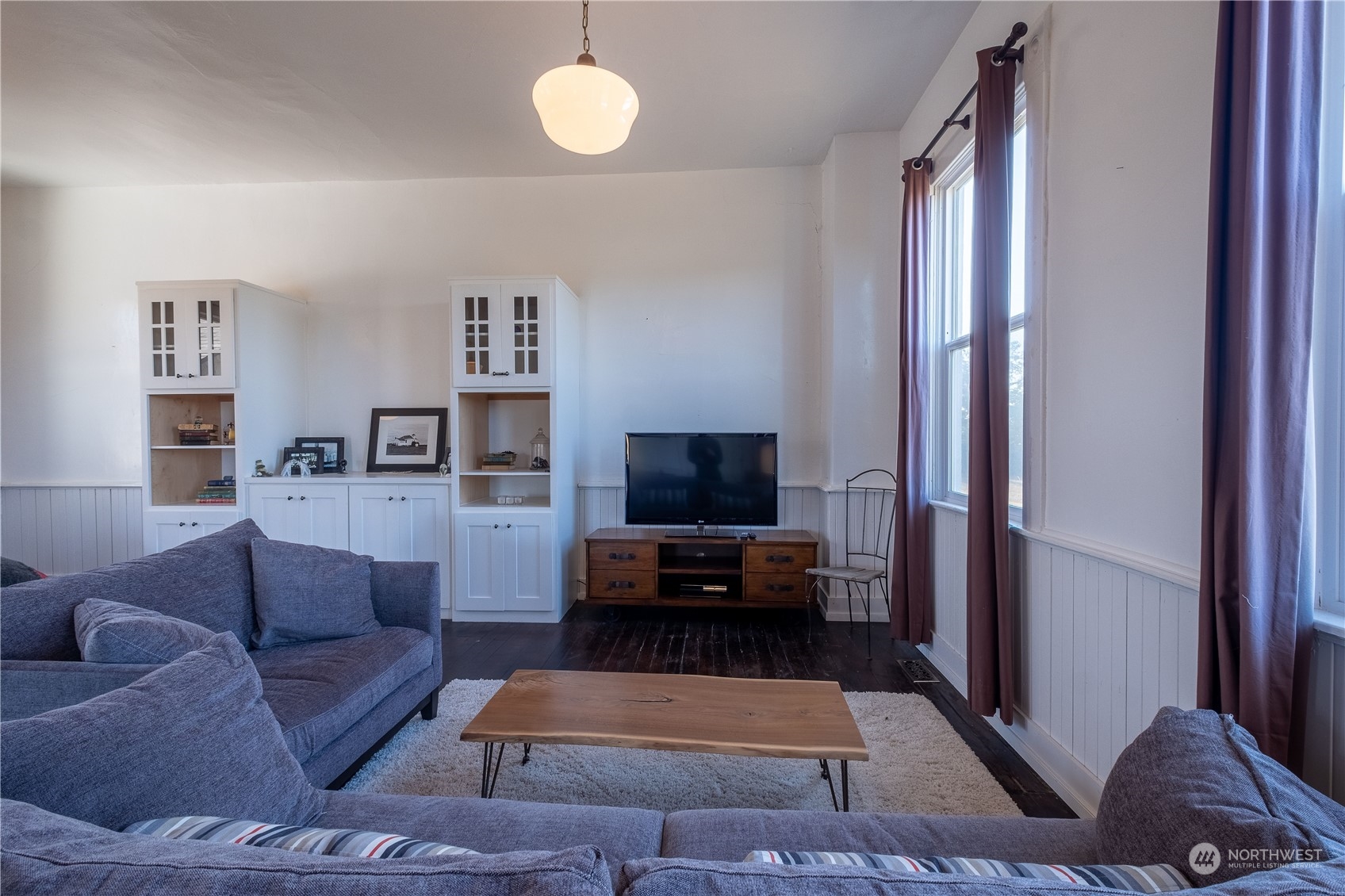 650 Zylstra Road Coupeville, WA 98239 - Photo 10 of 26 a living room with furniture and a flat screen tv