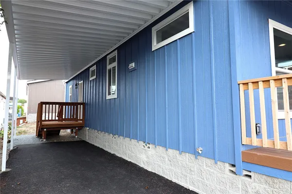 a view of balcony with furniture