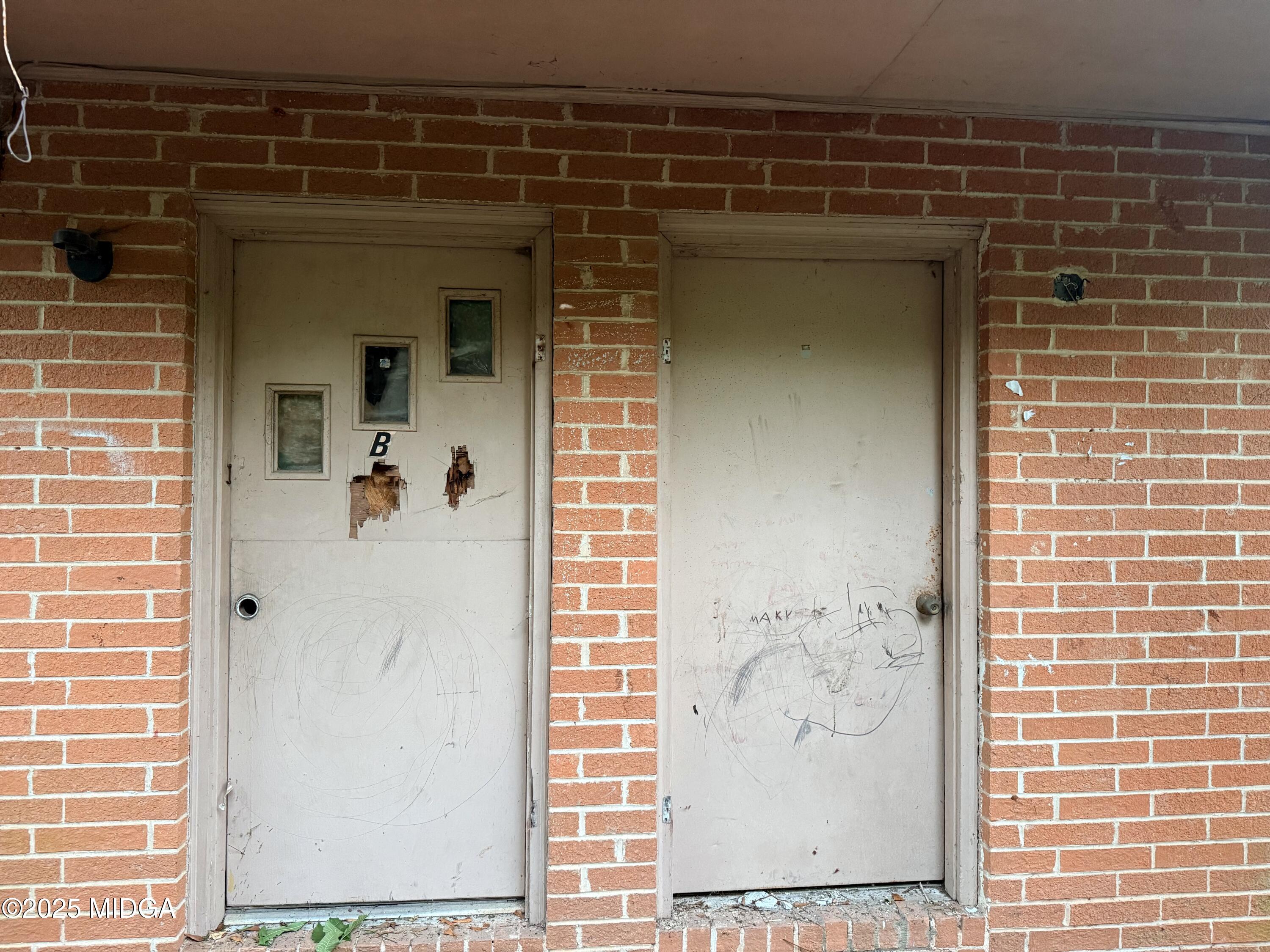 2753 Roy Street Macon, GA 31204 - Photo 2 of 8 a bathroom with a shower