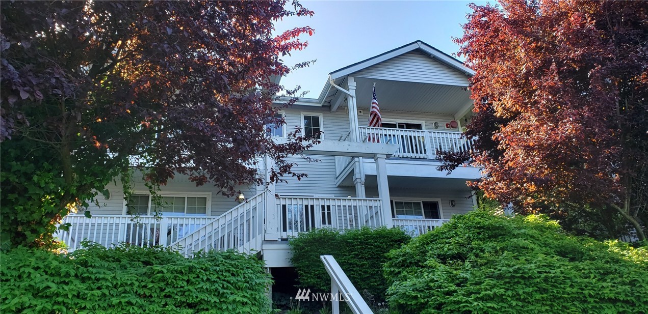 3722 Rucker Avenue Everett, WA 98201 - Photo 1 of 1 a front view of a house with yard and trees