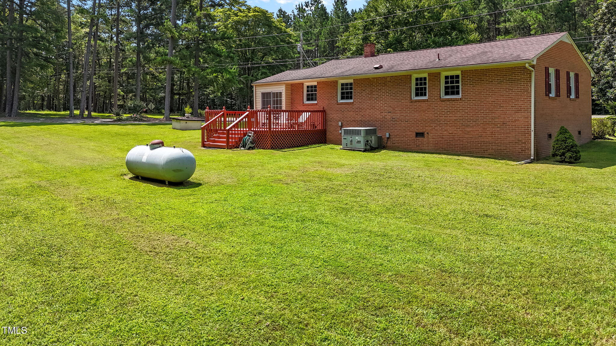 67 Pulliam-Tingen Mine Road Roxboro, NC 27574 - Photo 36 of 46 propane tank rear of house