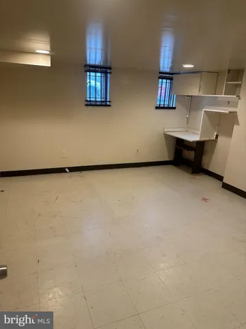 a bathroom with a toilet and a bathtub