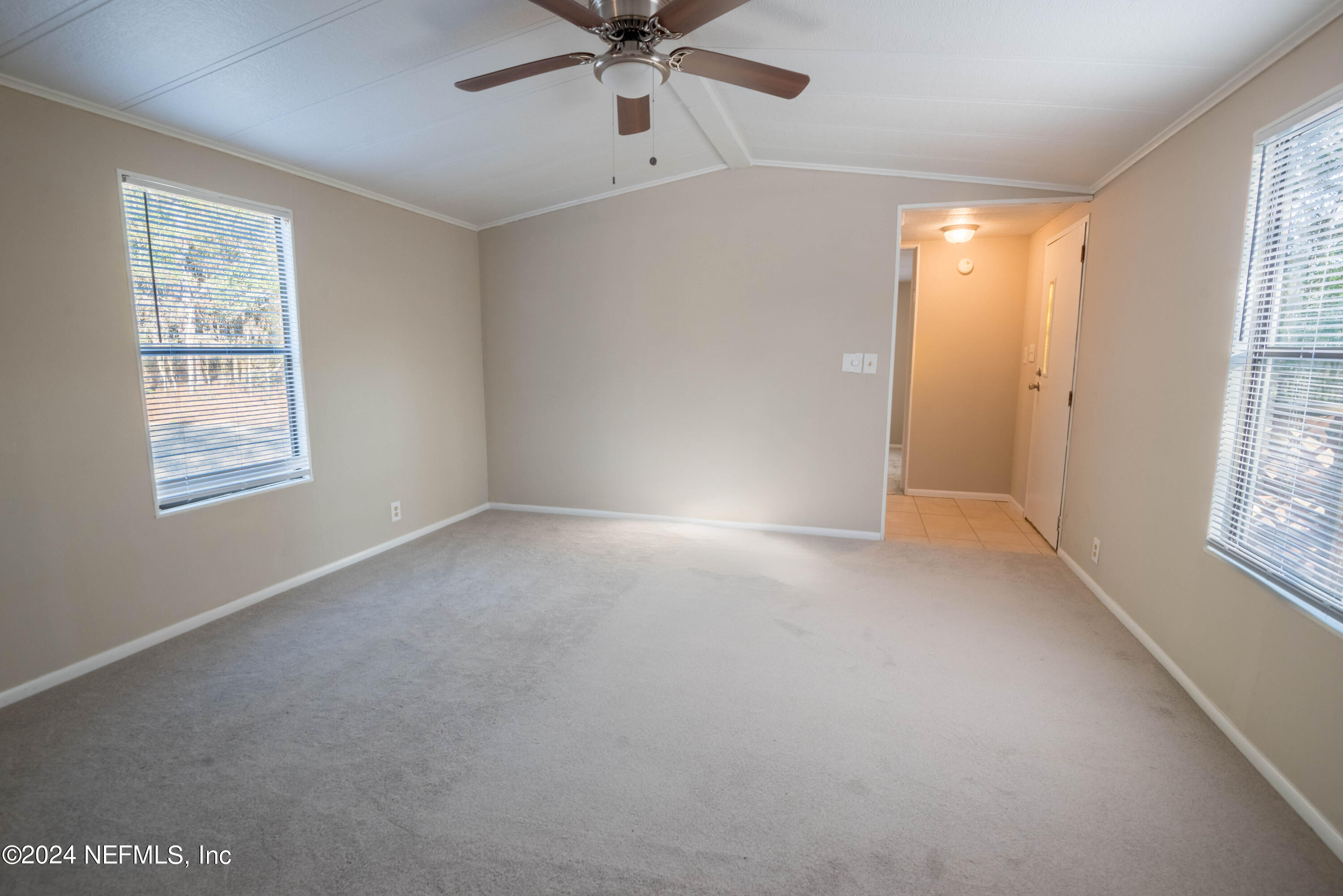 6787 Deer Springs Road Keystone Heights, FL 32656 - Photo 34 of 54 a view of an empty room with a window