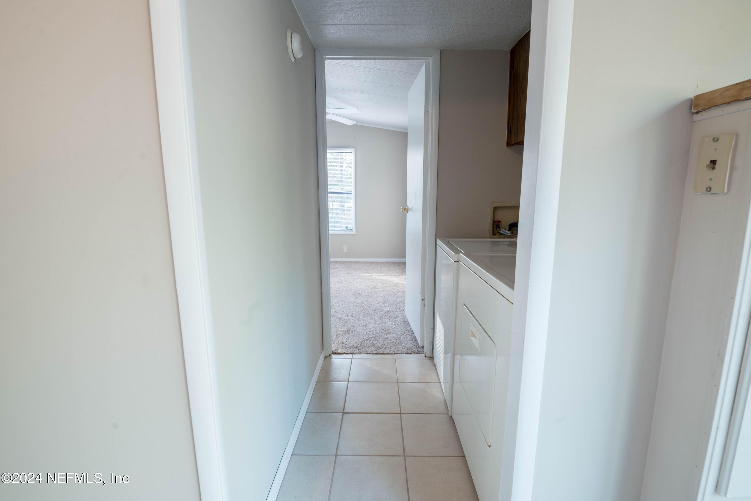 6787 Deer Springs Road Keystone Heights, FL 32656 - Photo 43 of 54 a bathroom with a sink and a mirror