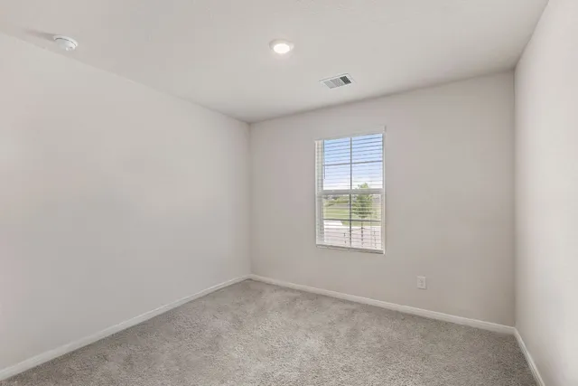 a bathroom with a sink toilet and vanity