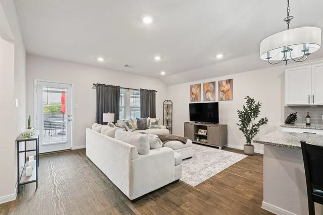 a view of a livingroom with furniture and storage