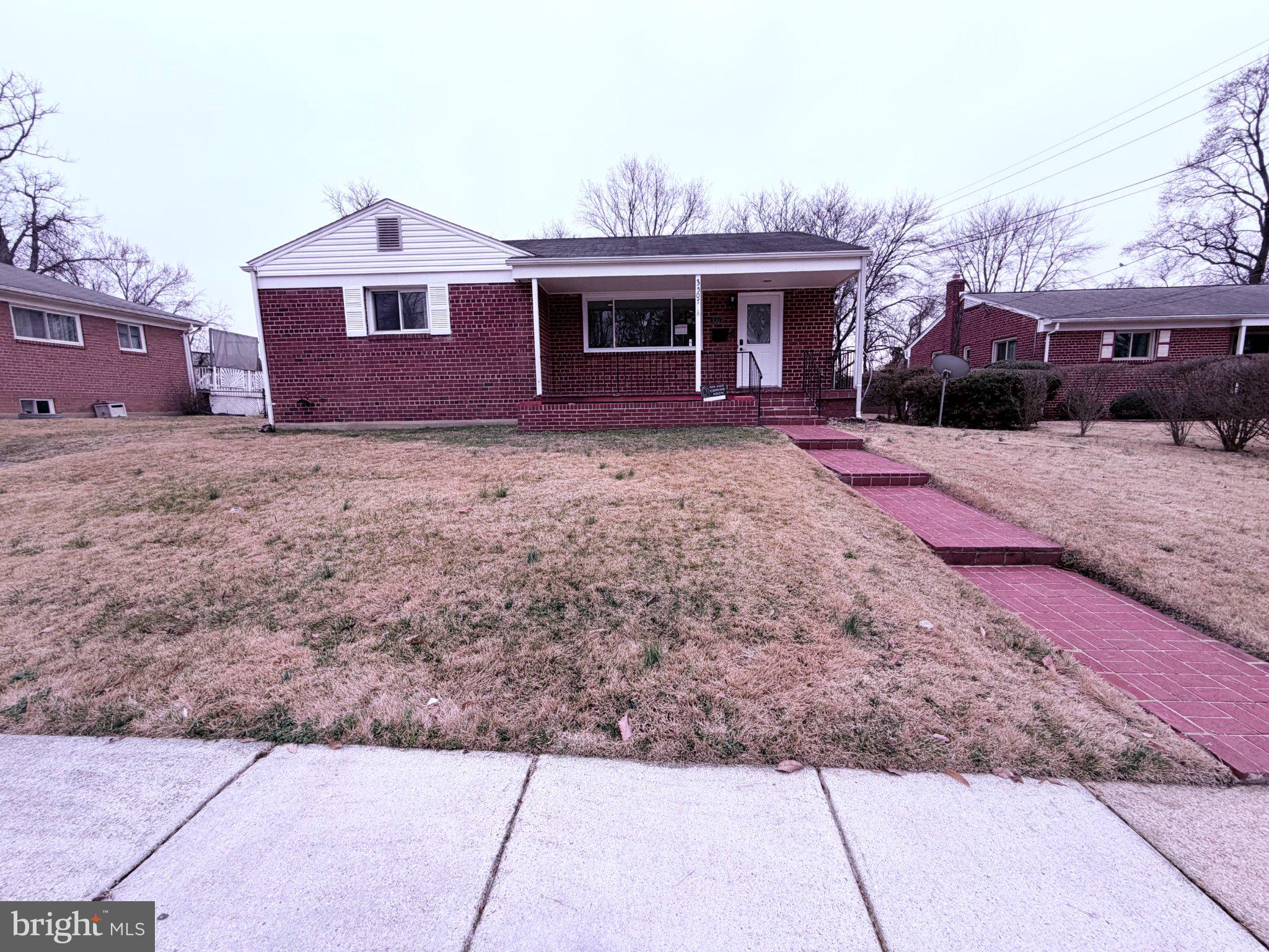 3507 Riviera Street Temple Hills, MD 20748 - Photo 1 of 7 Charming brick home with inviting path.