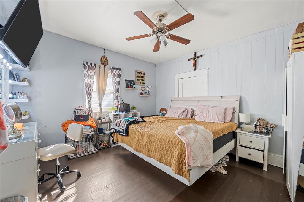 1615 Mitchell Avenue Waco, TX 76708 - Photo 12 of 14 a bedroom that has a bed and a chair in it