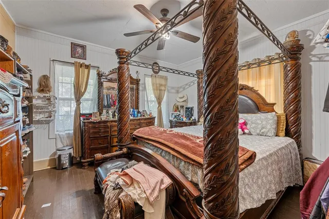 a backyard of a house with sofas