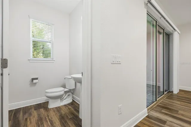 a bathroom with a toilet and a sink