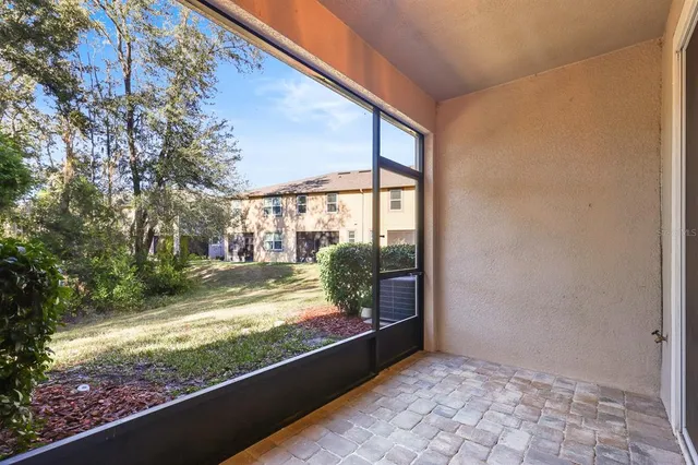 a view of a porch with a yard