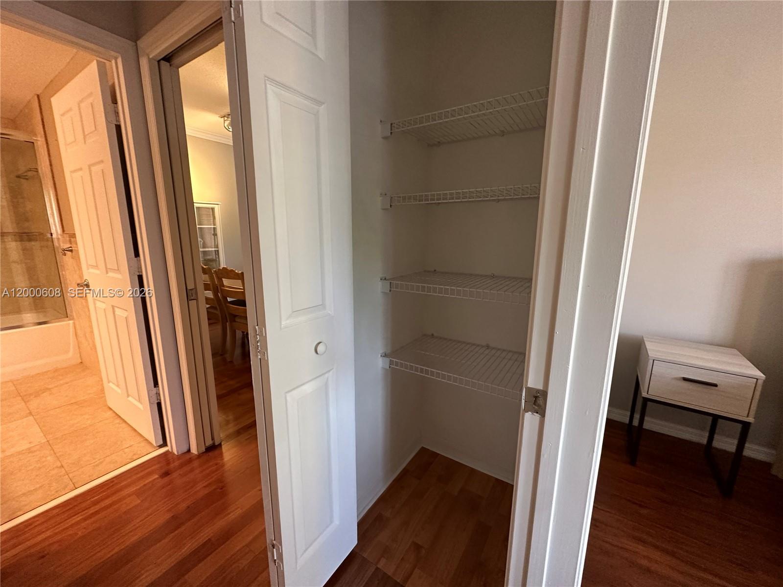 6841 Southwest 44th Street, Unit 209 Miami, FL 33155 - Photo 11 of 20 a view of a hallway and wooden floor