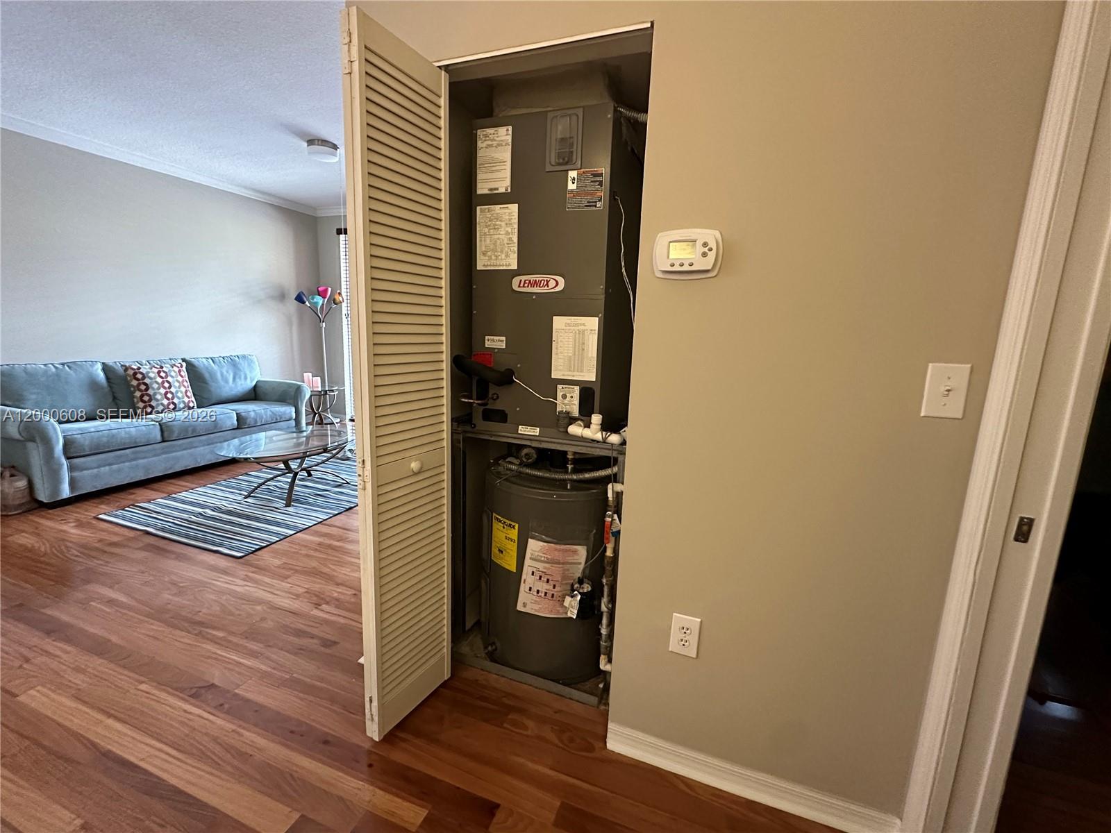 6841 Southwest 44th Street, Unit 209 Miami, FL 33155 - Photo 10 of 20 a view of living room with furniture and wooden floor