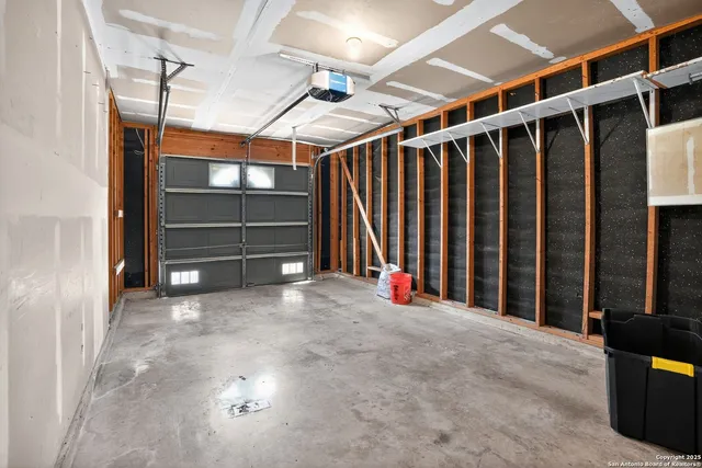 a view of an empty room with stairs