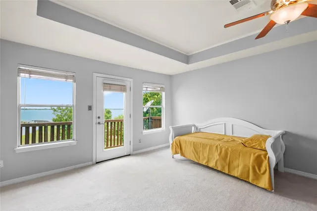 a living room with a couch and a chandelier