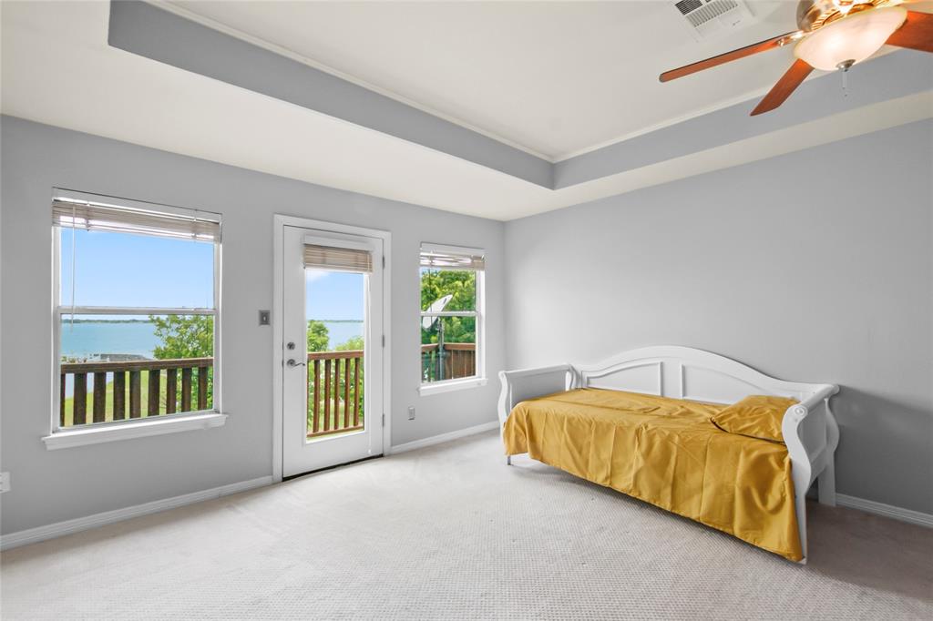 4020 Mediterranean Street Rockwall, TX 75087 - Photo 18 of 29 a bedroom with a bed and a window