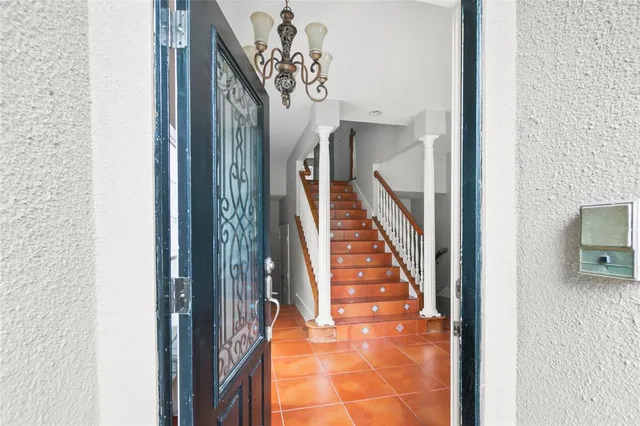 a view of entryway with wooden floor