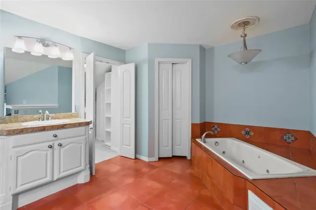 a front view of a residential apartment building with a yard