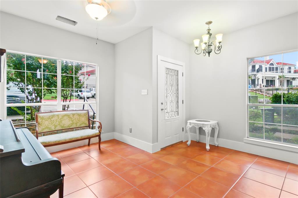 4020 Mediterranean Street Rockwall, TX 75087 - Photo 5 of 29 a view of a livingroom with furniture and a chandelier