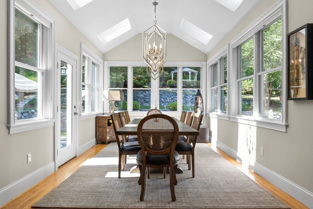 143 Lincoln Street Lexington, MA 02421 - Photo 11 of 42 a view of a dining room with furniture window and wooden floor