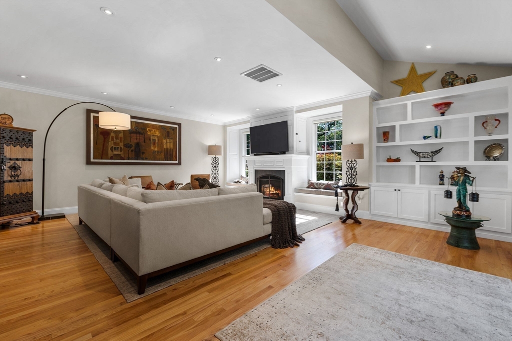 143 Lincoln Street Lexington, MA 02421 - Photo 16 of 42 a living room with furniture and a flat screen tv