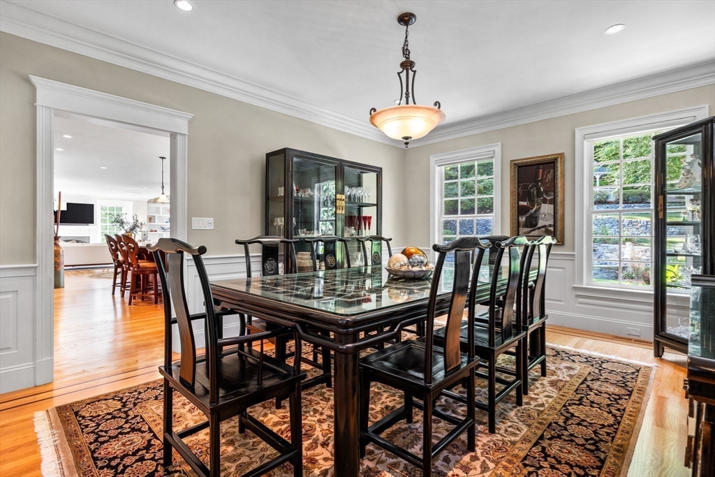 143 Lincoln Street Lexington, MA 02421 - Photo 20 of 42 a view of a dining room with furniture window and wooden floor