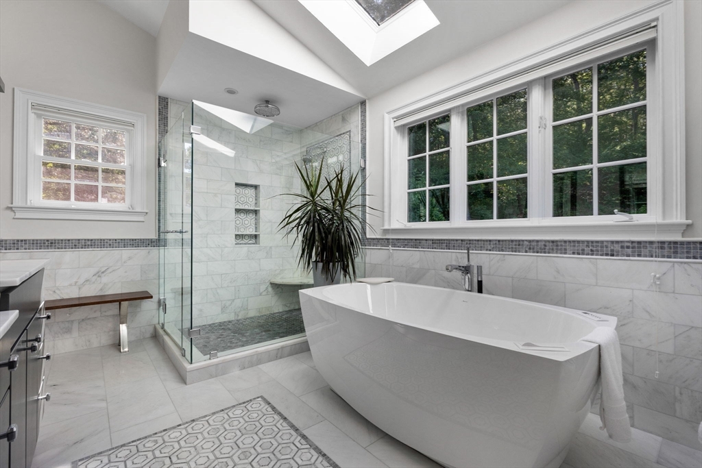 143 Lincoln Street Lexington, MA 02421 - Photo 33 of 42 a white bath tub sitting next to a window