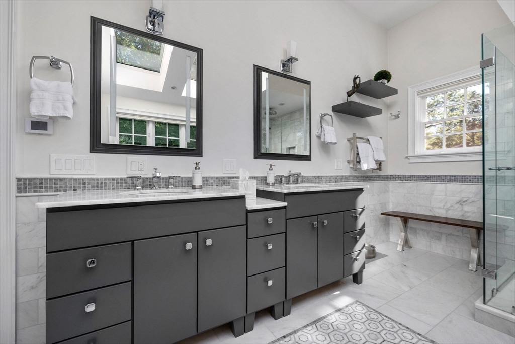 143 Lincoln Street Lexington, MA 02421 - Photo 34 of 42 a bathroom with a double vanity sink mirror and double