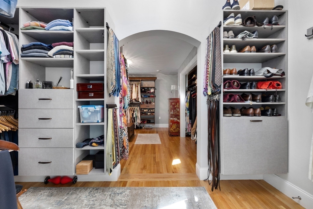143 Lincoln Street Lexington, MA 02421 - Photo 36 of 42 a view of walk in closet with clothes and shoes