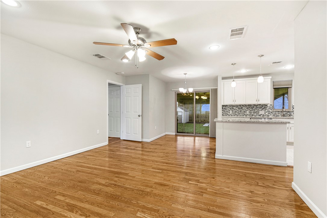 108 East Skyview Road Austin, TX 78752 - Photo 8 of 28 Open dining and living space offers flexibility for your lifestyle.