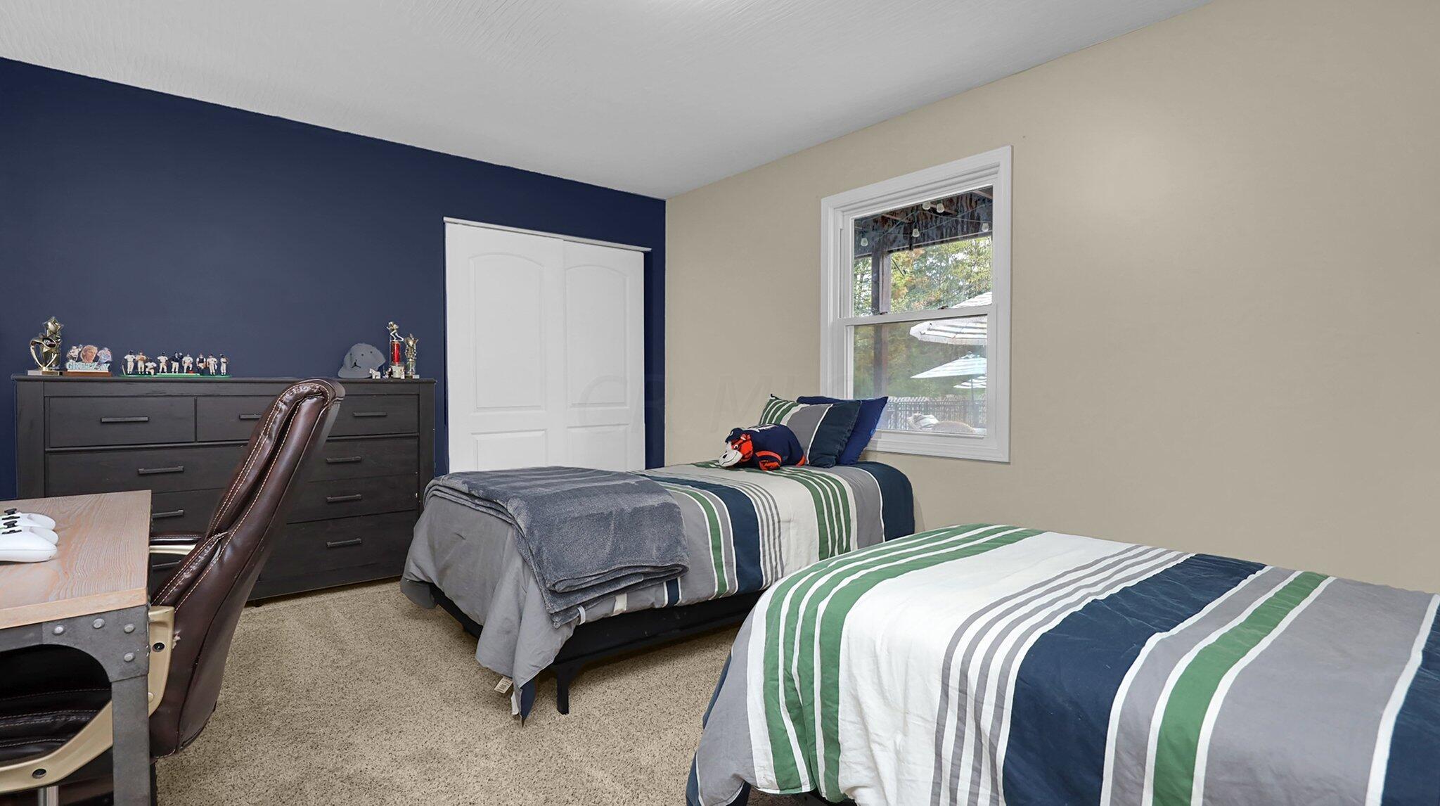 7790 Schott Road Westerville, OH 43081 - Photo 31 of 50 Bedroom #5 (located downstairs off of the family room) has a great view of the back patio, large closet, and ample space for a guest space, kids room, or workout area!
