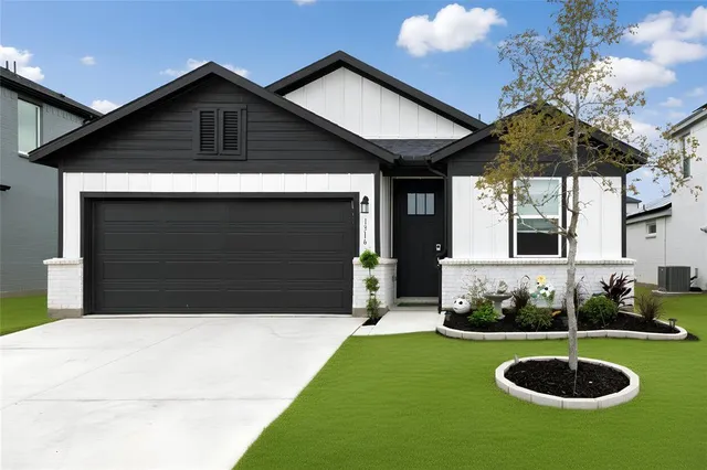 a front view of a house with entertaining space