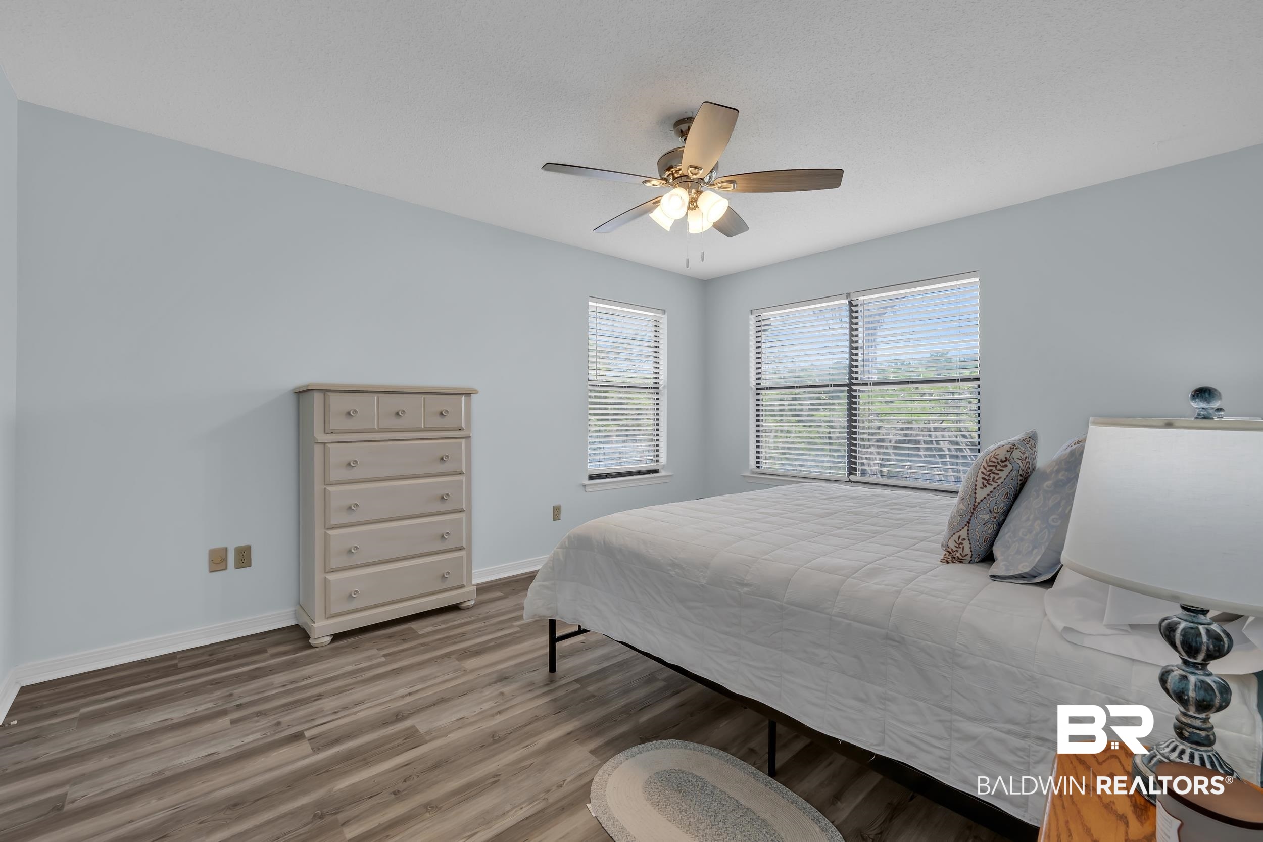 8081 Bryant's Lndg Road Stockton, AL 36579 - Photo 31 of 48 Bedroom with light wood-style flooring and a ceiling fan