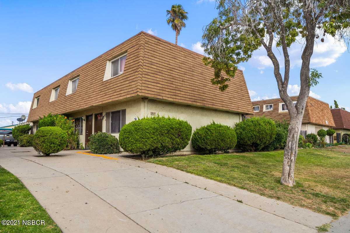 303 Sheila Lane Santa Maria, CA 93458 - Photo 1 of 13 a front view of a house with yard and green space
