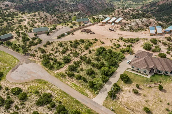 a view of a yard with a house