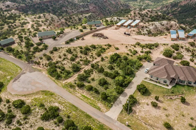a view of a yard with a house