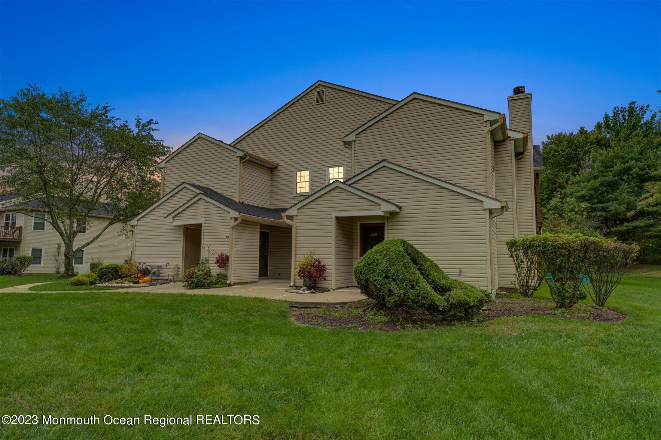 481 Hawthorne Place Morganville, NJ 07751 - Photo 1 of 26 a view of a house with backyard