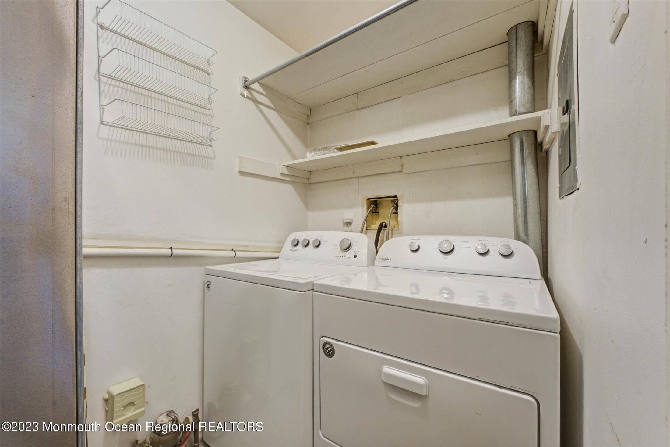 481 Hawthorne Place Morganville, NJ 07751 - Photo 23 of 26 a utility room with dryer and washer