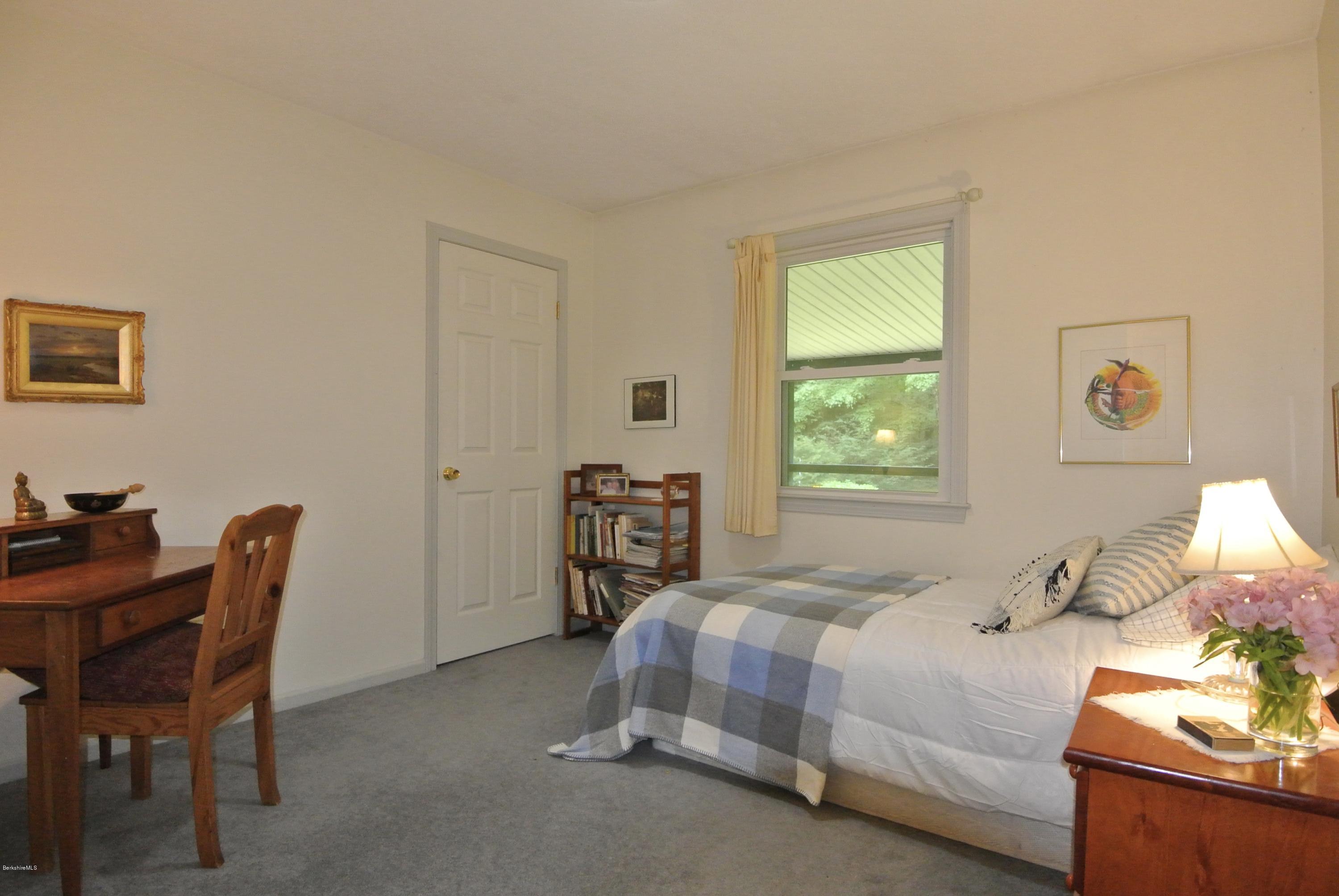 296 Salisbury Road Sheffield, MA 01257 - Photo 11 of 20 a bedroom with a bed and a table