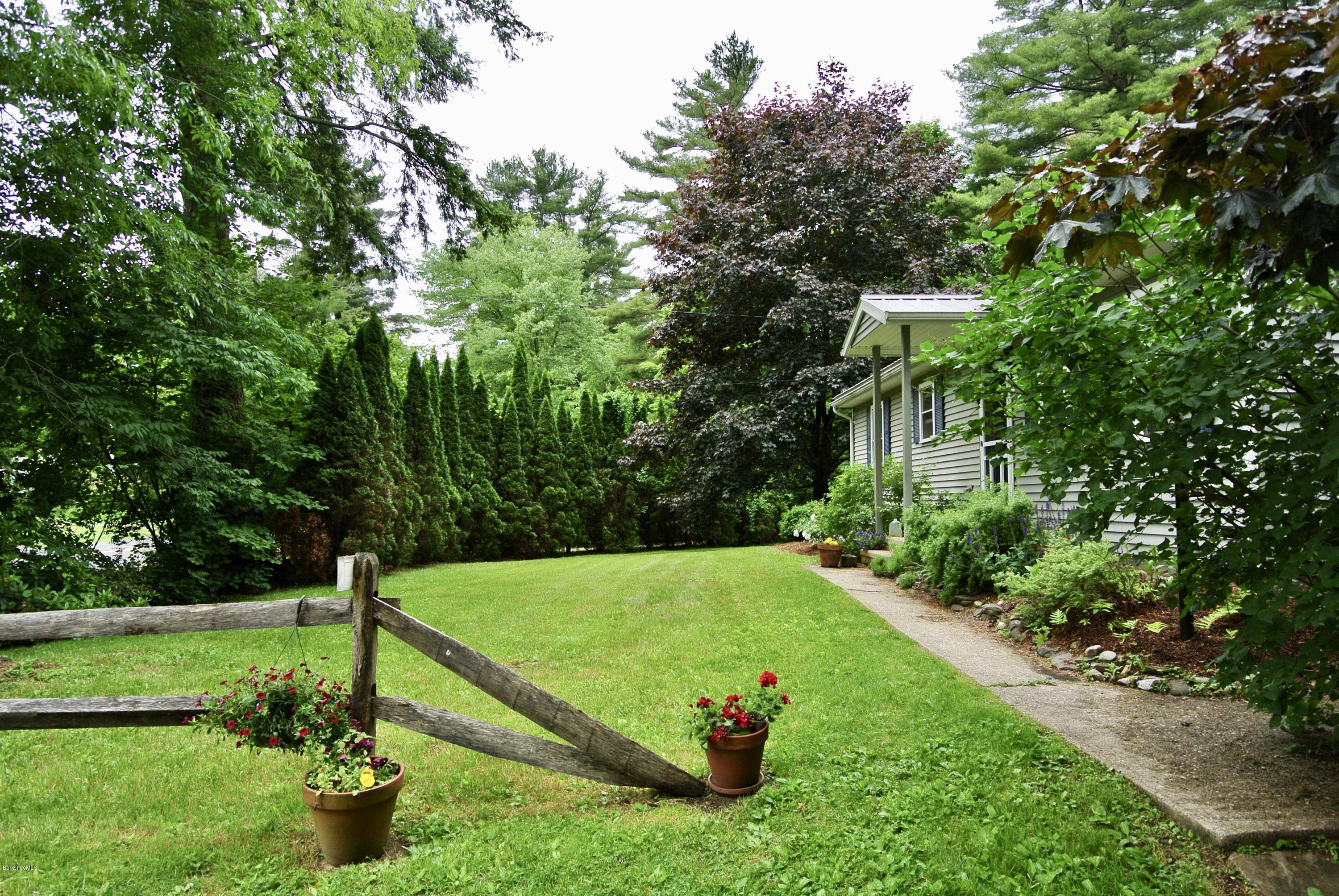 296 Salisbury Road Sheffield, MA 01257 - Photo 17 of 20 a view of a garden with an outdoor space
