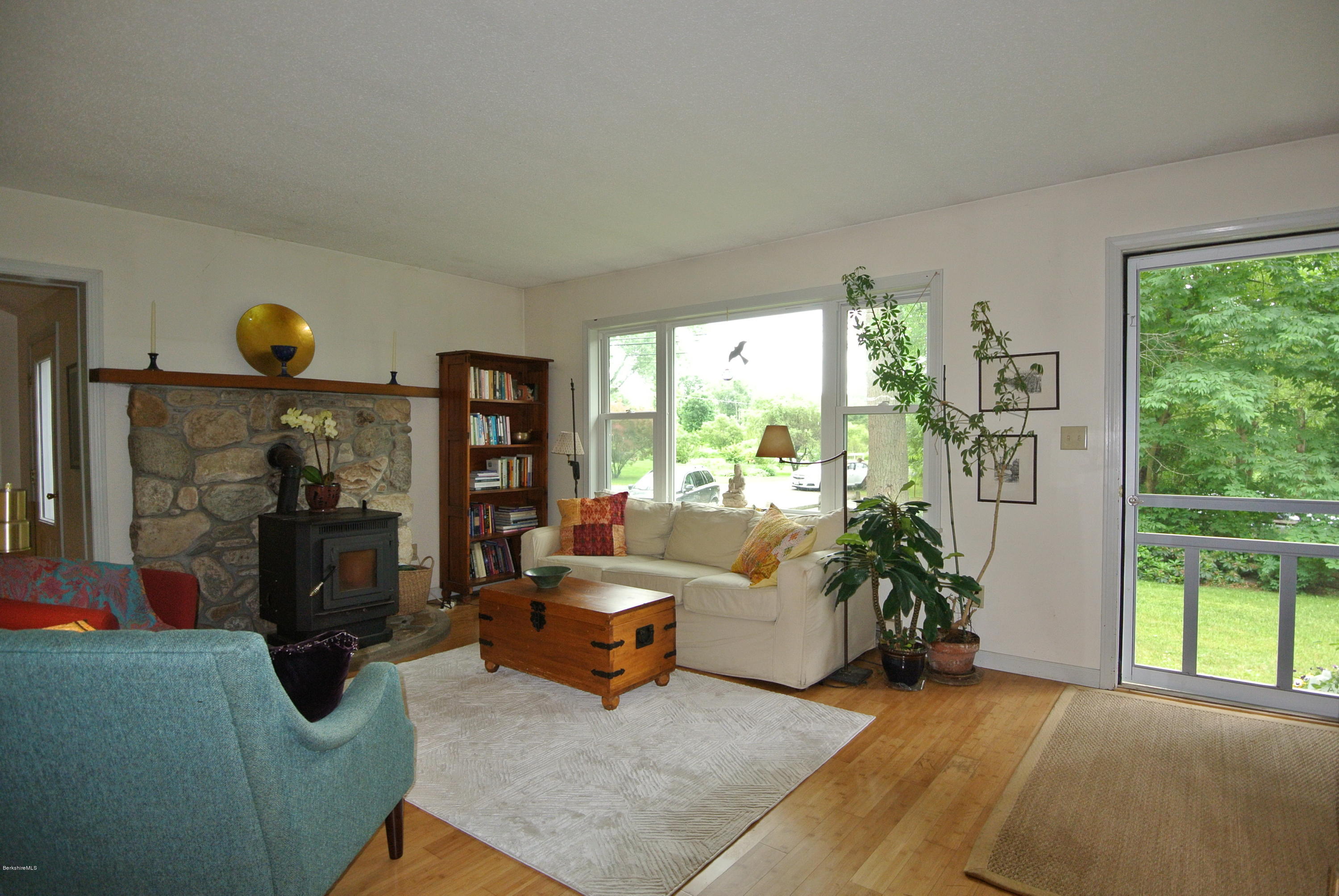 296 Salisbury Road Sheffield, MA 01257 - Photo 5 of 20 a living room with furniture and a floor to ceiling window