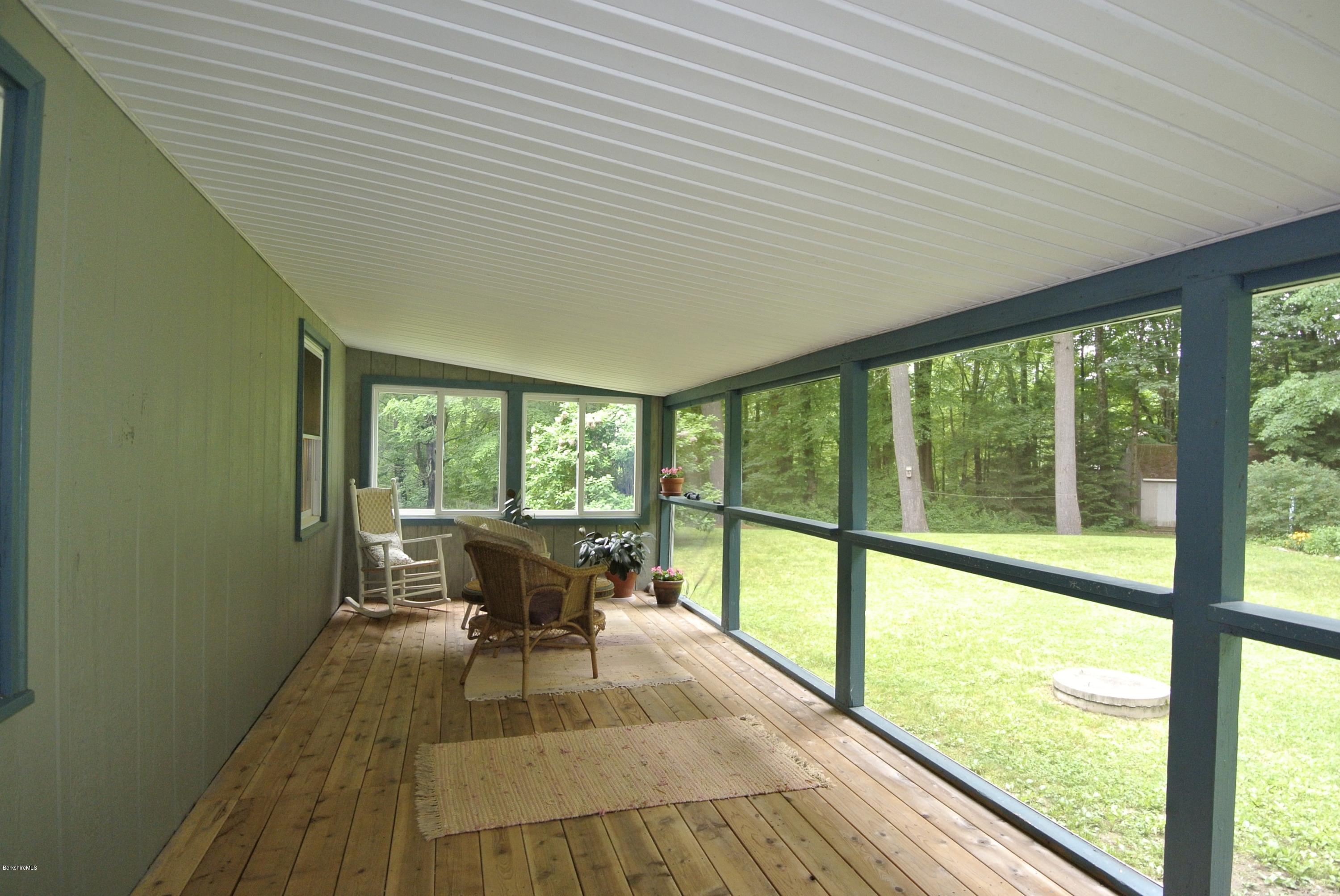 296 Salisbury Road Sheffield, MA 01257 - Photo 8 of 20 a view of a room with wooden floor and furniture