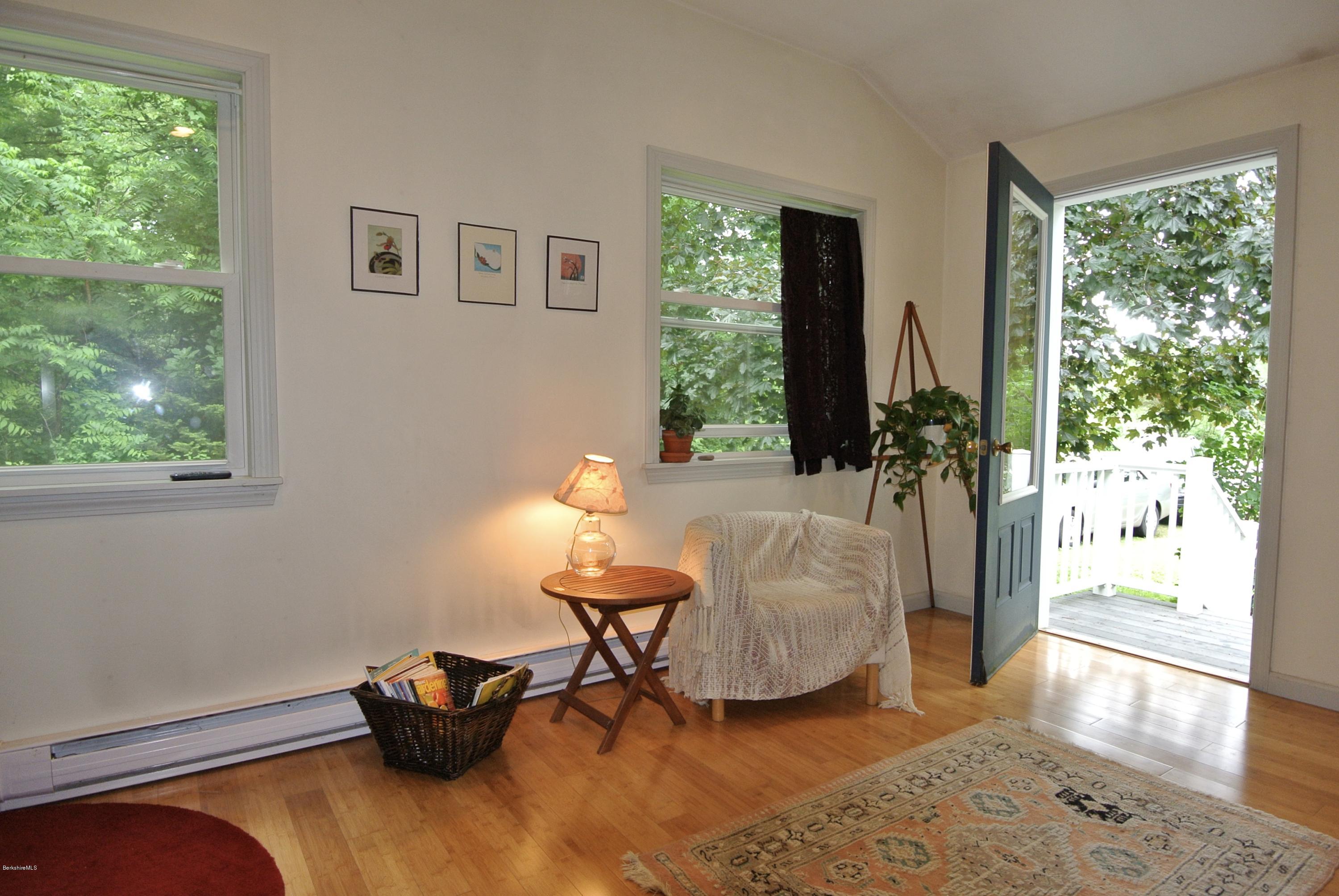 296 Salisbury Road Sheffield, MA 01257 - Photo 9 of 20 a living room with furniture and a potted plant